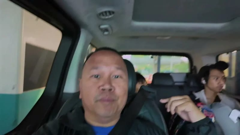 Inside a Hyundai Staria van with captain seats and a sunroof on the ride from the airport