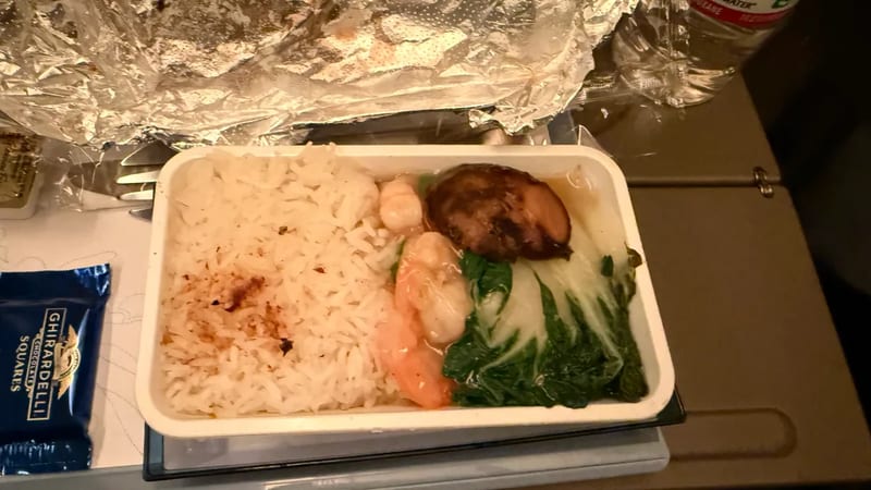 China Airlines dinner of rice, shrimp, shiitake mushroom and bok choy