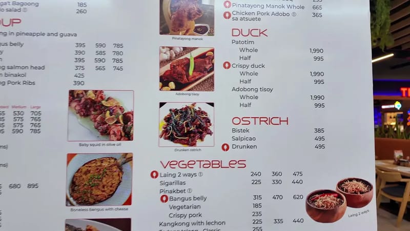 Mesa restaurant menu showing ostrich and duck dishes with peso prices