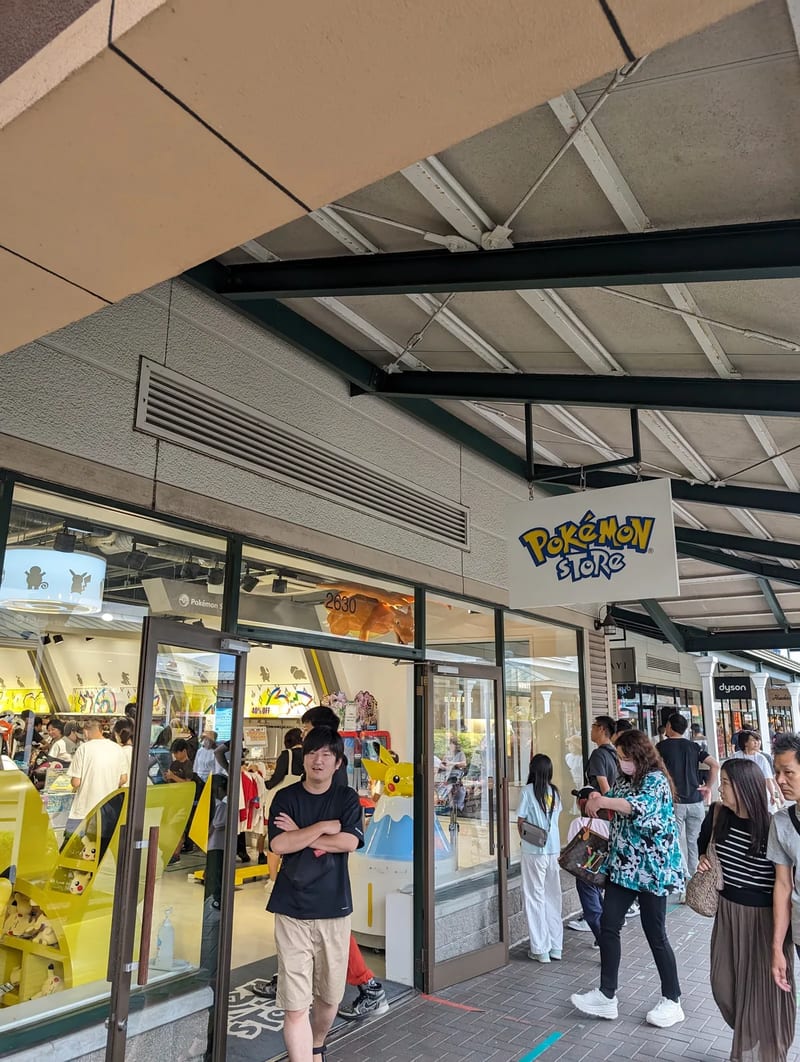 Pokémon store spotted in Japan — didn't go in, but noted Pokémon store exterior in Japan with colorful signage.