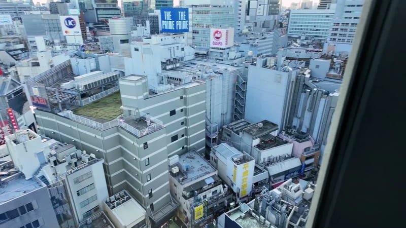 Aerial view of dense Tokyo rooftops and urban landscape from Hotel Indigo Shibuya, Tokyo, Japan